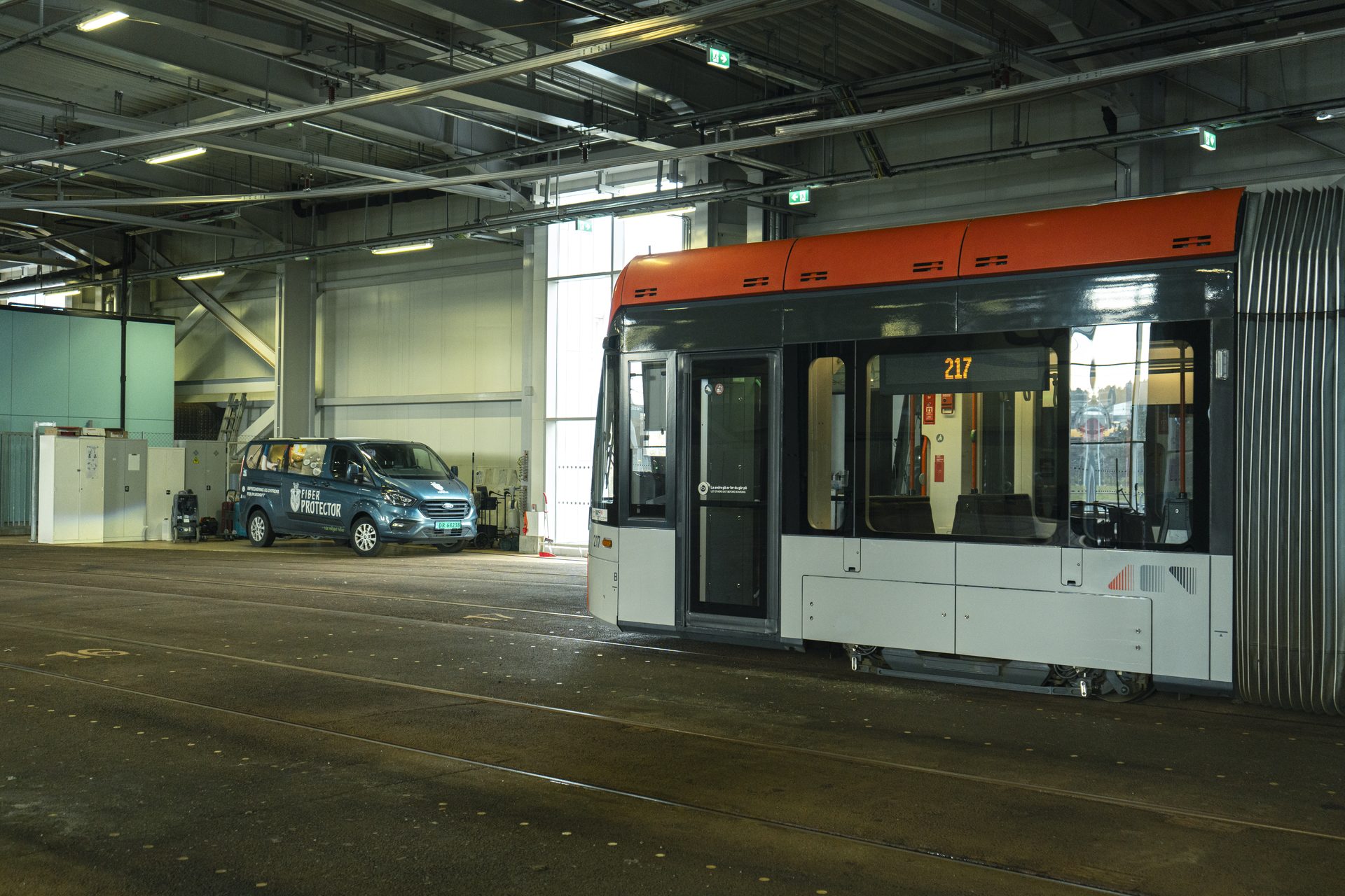 The service van in the depot at Bybanen — treatment happens while the vehicles are parked