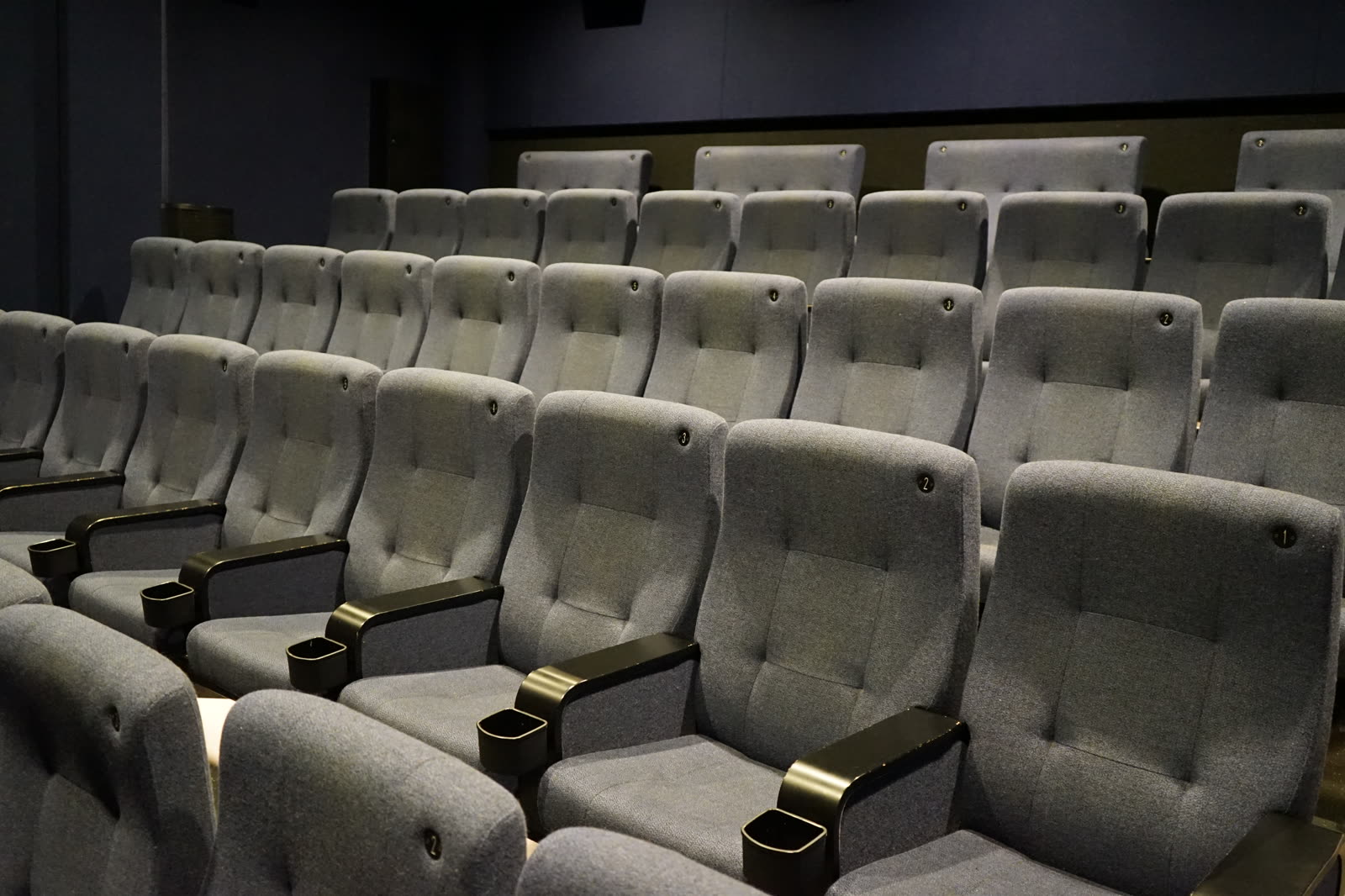 New grey cinema seats ready for impregnation