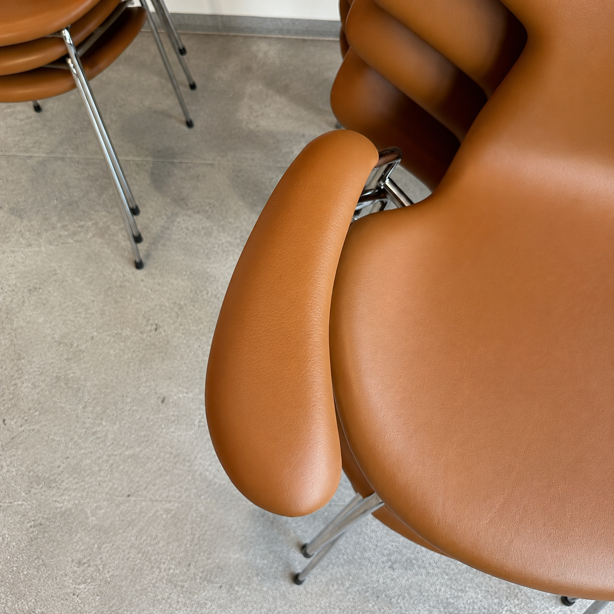 After treatment — smooth, well-preserved leather chair