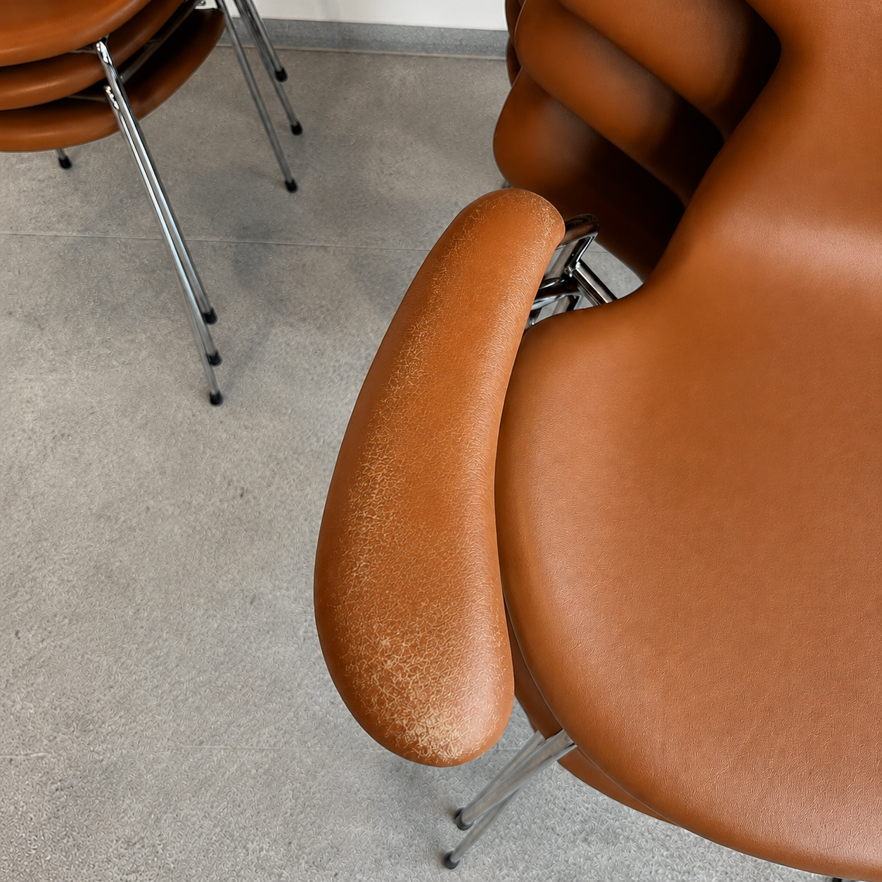 Before treatment — worn leather with cracks and discolouration