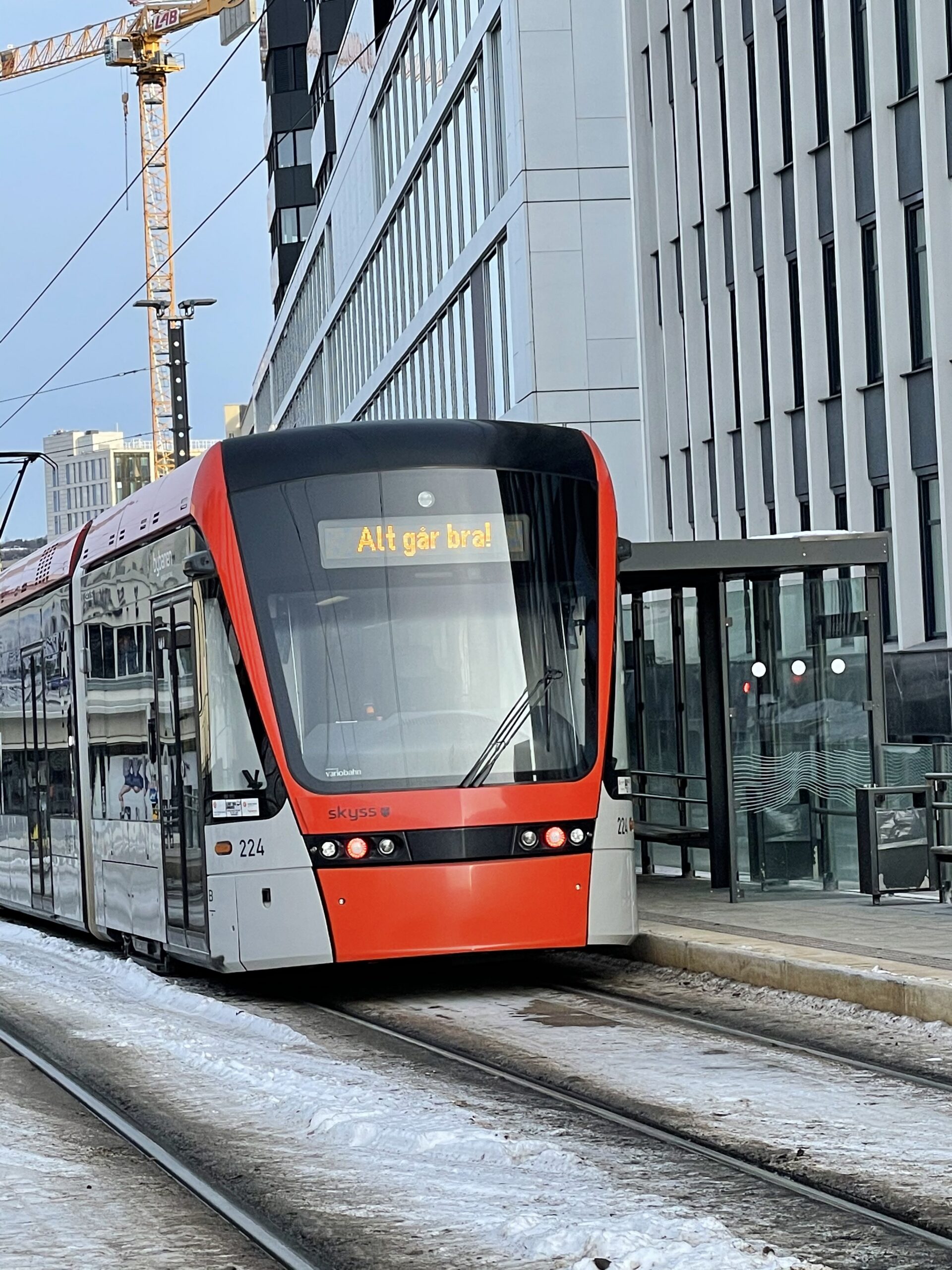 Bybanen in Bergen at a stop — Skyss vario light rail vehicle